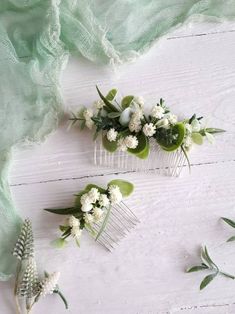 This Greenery Set 2 Hair Comb, a beautiful and delicate  hair accessory for brides and a nice gift to the bridesmaids On the wedding day, every bride wants to look fantastic. This delicate flower comb  will be a magical addition to your look on your happiest day.  This will emphasize the ease of your image.  The comb is very conveniently attached to the hair and fits in with any hairstyle.  -Material- artificial flowers and artificial greenery  -Colors- white and green - Size small comb - 3,2 inches (8 cm)(compositions)            big comb - 5,1 inches (13 cm) - Unique handmade.  Wedding - is one of the most important events in the life of any girl and it is the perfect accessory for a green wedding You deserve the best! Floral Hair Comb Wedding, Floral Hair Piece Wedding, Flower Garland Hair, Bridal Hair Pieces Flower, Flower Crown Bridesmaid, Bridal Floral Crown, Flower Crown Bride, Bridal Floral Headpiece, Floral Hair Comb