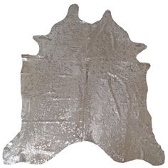 a cowhide rug is shown on a white background with silver flecks in the center