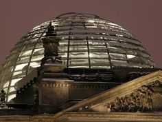 the dome of a building lit up at night