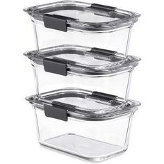 three glass containers stacked on top of each other, with lids and black plastic handles