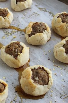 baked pastries are sitting on a baking sheet