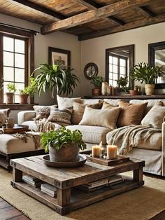 a living room filled with lots of furniture and plants on top of it's tables