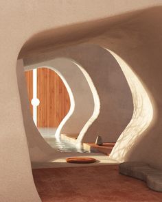 the interior of a building with curved walls