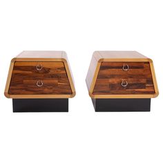 two wooden boxes sitting side by side on top of each other