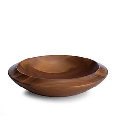 two wooden bowls sitting on top of each other