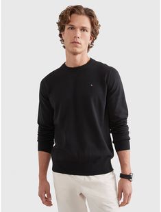 Tommy Hilfiger men's sweater. In colors for every season and mood, our crewneck sweater is made from soft, premium cotton and cut in an easy fit.  Material: 100% Better Cotton Initiative. Modern Crew Neck Sweater For Everyday, Modern Crew Neck Sweatshirt With Ribbed Cuffs, Modern Solid Crew Neck Sweater, Modern Solid Color Crew Neck Sweater, Modern Crew Neck Sweater, Classic Cotton Crew Neck Sweater, Tommy Hilfiger Classic Crew Neck Sweater, Modern Crew Neck Sweater With Ribbed Cuffs, Classic Solid Crew Neck Sweatshirt