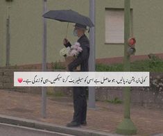 a man with an umbrella standing on the street