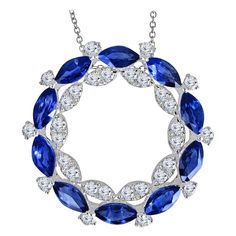 This sapphire pendant defines opulence with its breathtaking double halo design. This captivating piece is a true work of art, featuring a symphony of gemstones that will leave you in awe. On the outer halo, you'll find a striking arrangement of 10 marquise-cut blue sapphires, elegantly alternating with 10 dazzling round natural diamonds. This juxtaposition of shapes and colors creates a mesmerizing outer layer that draws the eye in. The inner halo is equally enchanting, boasting 20 round diamon Tiffany Engagement, Tiffany Engagement Ring, Round Diamond Pendant, Gold Heart Pendant, Marquise Shape Diamond, Diamond Necklace Set, Antique Pendant, Heart Pendant Gold, Halo Pendant