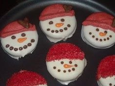 six frosted cupcakes in the shape of snowmen