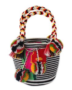 Our latest bluma "project" is working with the Wayuu women of Colombia to create unique and intricately patterned bags. All custom patterns designed by us! This hand-carry mini purse is the must-have bag of the season! 7"W x 6" H 14" straps.Hand crocheted in acrylic. Artisan Woven White Shoulder Bag, Artisan White Handwoven Shoulder Bag, Artisan Handwoven White Shoulder Bag, White Artisan Handwoven Shoulder Bag, White Handwoven Artisan Shoulder Bag, Artisan Black Bucket Bag For Everyday Use, Black Artisan Bucket Bag For Everyday, Handmade Multicolor Top Handle Bucket Bag, Handmade Artisan White Bag