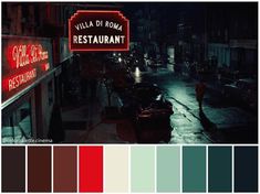 an image of a restaurant sign lit up in the dark at night with color swatches