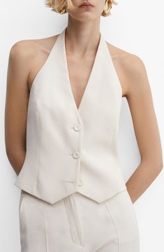 A halter neck and an open back transform a classic workwear piece into something that's all about what happens outside the office. Front button closure Halter neck Partially lined 93% viscose, 7% polyester Dry clean or machine wash, line dry Imported White Vest Suit, Woman In Suit, Classic Workwear, Dress Vest, Mango Suit, Suit Waistcoat