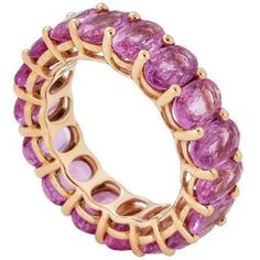 Imagine a ring that exudes timeless elegance and beauty. The Piranesi Oval Eternity Band in Pink Sapphire is a breathtaking piece of fine jewelry that embodies both qualities. The ring is expertly crafted from 18K yellow gold, which perfectly complements the stunning 9.65 carats oval pink sapphire that adorns it. The eternity band design features a continuous line of pink sapphires that wrap around the entire ring, creating a dazzling effect that is sure to turn heads. Whether you are looking to Luxury Oval Ruby Ring, Luxury Oval Ruby Ring With Prong Setting, Luxury Marquise Ruby Ring, Luxury 14k Gold Oval Sapphire Ring, Luxury Pink Sapphire Round Ring, Luxury Pink Sapphire Ring, Exquisite Pink Sapphire Round Rings, Elegant Pink Sapphire Eternity Band, Exquisite Pink Sapphire Rings For Formal Occasions