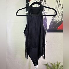 Verdusa Bodysuit Black With Tassels On The Front Sleeveless Velcro At The Bottom Sleeveless Nwt Size M Bodysuit With Tassels Size M Nwt Verdusa Rodeo Country Cowgirl 89% Polyester 11% Elastane Black Sleeveless Swimwear For Party, Sleeveless Summer Bodysuit For Festivals, Sleeveless Bodysuit For Summer Festivals, Sleeveless Summer Bodysuit For Evening, Black Sleeveless Swimwear For Evening, Sleeveless Summer Evening Bodysuit, Sleeveless Beachwear Bodysuit For Party, Summer Party Swimwear With Fringe, Stylish Sleeveless Bodysuit For Party