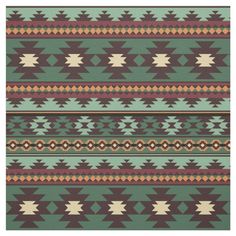 an area rug with different colors and patterns on it, including brown, green, beige and