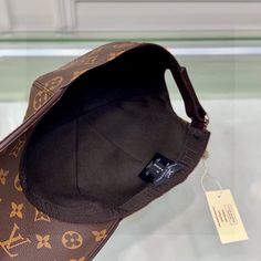 SHOP MORE LUXURY PRODUCTS HERE Description Louis Vuitton LV Get Ready Cap Monogram Brown LV Cap Part of a new capsule collection for Fall-Winter 2021, the LV Get Ready Cap presents a fresh take on House signatures. It features the iconic Monogram motif in different colors on the top and brim, as well as a contrasting edge. This accessory can be paired with other items from this statement-making selection. BrownDry clean onlyMonogram pattern Includes box, dust bag.This product is of the premium q Luxury Brown Cap, Luxury Adjustable Brown Baseball Cap, Designer Brown Baseball Cap, Luxury Brown Baseball Cap With Curved Visor, Luxury Brown Visor Baseball Cap, Designer Brown Visor Baseball Cap, Louis Vuitton Hat, Dior Shirt, Louis Vuitton Shirt