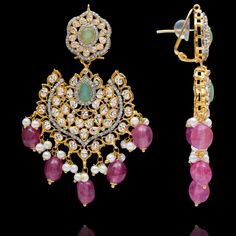 Indulge in the allure of this exquisite jewelry set and let contemporary grace redefine your fashion narrative! Radiate elegance and dangle in delight with our enchanting Esha Set – a mesmerizing blend of elegance and vibrancy meticulously crafted with sparkling zircons, complemented by the refreshing allure of mint green stones, and embellished with delicately dangling fuschia pink beads to elevate your style with the perfect harmony of sophistication and playfulness. The set includes a necklac Fusion Style Festive Jewelry Sets With Elegant Design, Fusion Style Jeweled Bridal Earrings, Fusion Style Jeweled Jewelry Sets For Wedding, Elegant Bridal Earrings With Stone Work In Cubic Zirconia, Elegant Kundan Jeweled Chandelier Earrings, Elegant Kundan Chandelier Earrings Hand Set, Fusion Style Gemstone Chandelier Earrings For Wedding, Fusion Style Jewelry Sets For Reception, Elegant Jeweled Jewelry Sets For Reception