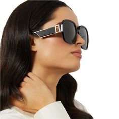 If you're looking for ultimate elevated glam, you've found it in the Tina II sunglasses. With thick acetate, oversized lenses, and luxe gold metal details including a rectangular cut-out at the temples, these shades are meant to be seen. Black Sunglasses With Mirrored Lenses For Fashion, Modern Black Sunglasses For Fashion, Modern Black Sunglasses, Modern Acetate Shield Sunglasses, Trendy Black Shield Sunglasses In Acetate, Polarized Sunglasses, Black Grey, Gold Metal, Meant To Be