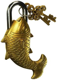 a gold fish keychain hanging from a hook with keys attached to it's side