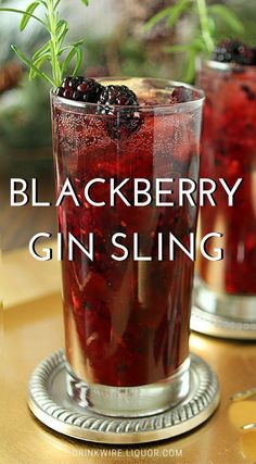 blackberry gin sling cocktail in two glasses with rosemary garnish on the rim and text overlay that reads, blackberry gin sling