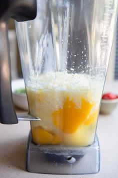 a blender filled with liquid and eggs