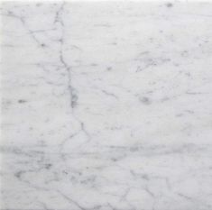 a white marble tile with grey veining