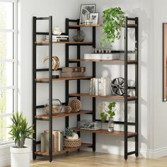 a living room with a book shelf in the corner