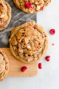 raspberry white chocolate chip cookies on a cutting board