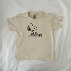 Handmade Screenprinted Music Snoopy Baby Tee  Peanuts Cartoon Design  vintage  Music Lover  Unique Baby Tee  y2k clothing  Pinterest  Shirt Outfit Ideas  Shirt Design Ideas Easy 30 day return policy Snoopy T Shirts Vintage, Cute Graphic Shirts, Basic Graphic Tees, Snoopy Clothes, Snoopy Tshirt, Cute Baby Tees, T Shirts For Women Casual, Outfit Ideas Shirt, Snoopy Baby