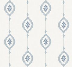 a white and blue wallpaper with snowflakes hanging from the side on it