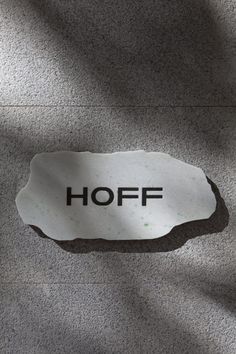 a piece of paper with the word hoff on it is shown in black and white