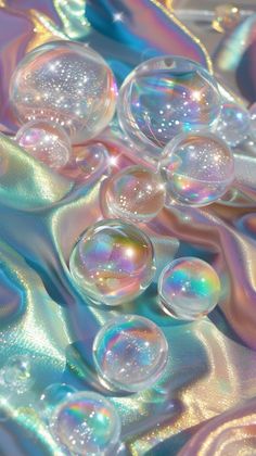 soap bubbles floating on top of a shiny surface with iridescent colors and sparkles