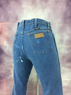 "Size 32 Distressed Wrangler Vintage Western Jeans, waist 32\" large, W32 L31 . Brand: WRANGLER Size On Tag marked 34x32 but fits more like 32\" waist, 13\" rise, 25\" thighs, 43\" hips, 31.5\" inseam, 16\" leg opening! Fits a size 32, but check your measurements and compare the measurement with your garment. (see full measurement below) Recommended for waist size 32\" Material :  ✂ Cotton 100% ✂ Zipper ✂ Made In Mexico of U.S Fabric ✂ Distressed Jeans CONDITIONS:- Distressed/hole/Ripped (see ph Rodeo Rider, Jeans West, Wrangler Vintage, Cowboy Rodeo, Western Jeans, Jean Vintage, Jeans Mom, Vintage Wrangler, Vintage Western