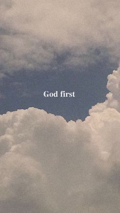 the words god first are written in white on a cloudy blue sky above some clouds