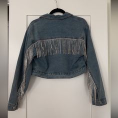 Brand New Denim Jacket. Oversized Fit. Blue Denim Jacket With Fringe, Oversized Denim Outerwear With Patches, Fitted Fringe Long Sleeve Denim Jacket, Denim Jacket Oversized, Fringe Denim Jacket, Oversized Collared Single-breasted Denim Jacket, Oversized Single-breasted Denim Outerwear, Rhinestone Fringe, Oversized Fits