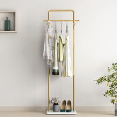 PRICES MAY VARY. Gold Clothing Rack: Are you looking for an adorable, modern, small clothing rack to live in your bedroom, dressing room, cando, student adore for your hats, scarves, dress, skirts, suits and other fashion clothes? Look no further! This gold clothes rack is what you want. The gold pipe clothing rack is crafted of premium metal featuring anti-rust and using nano gold paint to keep surface smooth, also make the gold color so shiny, which bring elegant atmosphere for your home. Eleg Free Standing Coat Rack, Coat Hanger Hooks, Tree Coat Rack, Entryway Coat Rack, Modern Entry, Hall Stand, Bed Design Modern, Everyday Clothes, Gold Outfit