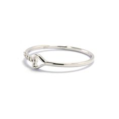 This simple yet beautiful diamond heart ring is stamped with 14k/18k gold. The ring is made with real gold and diamonds. You can get the ring engraved with your friends or lovers to use it as a friendship ring or promise ring. The ring also makes a great gift for little girls and daughters. Other Heart Rings: https://etsy.me/2O2ikL8 https://etsy.me/2GlsVe5 Heart Diamond Ring Details: Natural Diamond Total Carat: 0.04 carats Total number of diamonds: 5 Diamond Color: G Diamond Clarity: SI (Eye cl Dainty White Gold Heart Promise Ring, Valentine's Day Dainty Cubic Zirconia Rings, Heart Shaped Diamond Ring With Single Diamond, Dainty White Gold Diamond Heart Ring, Valentine's Day Single Diamond Ring In Fine Jewelry Style, Dainty White Gold Heart Ring For Promise, Dainty Sterling Silver Heart Cut Diamond Ring, Dainty White Gold Heart Ring For Anniversary, Dainty White Gold Heart Cut Heart Ring