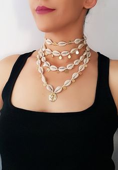 Elegant Cheap Shell Necklaces, Cheap Festival Shell Strand Necklace, Cheap Bohemian Shell Necklace For Vacation, Luxury Shell-shaped Beach Necklaces, Bohemian Beach Clavicle Chain Necklace, Bohemian Clavicle Chain Necklace For Beach, Beaded Shell Choker Necklace, Beach Season Shell Jewelry For Festivals, Summer Necklaces With Cowrie Shell