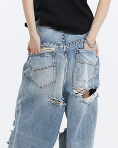 Embrace your unique style with our Distressed Ripped Knee Wide-Leg Denim Jeans, the epitome of laid-back chic.
Expertly crafted from soft, high-quality denim, these jeans feature a relaxed wide-leg fit and artfully placed distressed knee rip details for an authentically worn look. The washed denim blue hue and thoughtful distressing convey an air of effortless sophistication, while providing comfort and durability for your everyday adventures.
Mix and match with your favorite tees or dress them Jean Large, Everyday Adventures, Ripped Denim, Washed Denim, Wide Leg Denim, Denim Wash, Distressed Jeans, Denim Pants, Wardrobe Essentials