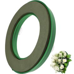 there is a green circle with flowers on it and the letter o next to it