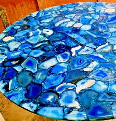 a table with blue and white glass on it