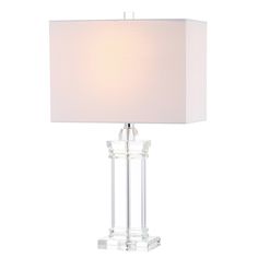 a clear table lamp with a white shade