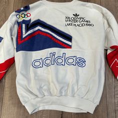 *Not In Mint Condition*- Has Very Minor Yellowing Around Collar And Staining On Back Of Sweatshirt (Could Be Removed Easily With Bleach Pen). Vintage Olympic Games Adidas Sweatshirt. No Collar Tag. I Believe It’s A Men’s L To Xl Adidas 1980, Bleach Pen, Winter Games, Lake Placid, Adidas Sweatshirt, Vintage Adidas, White Adidas, Olympic Games, Adidas Men