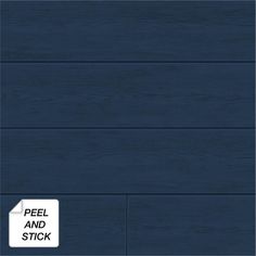 dark blue wood grained paneling with peel and sticker on the left side