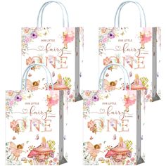 three paper bags with flowers on them and the words, little fairy one are shown