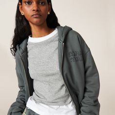 Find MIU MIU Gart Dyed Cotton Fleece Hoodie on Editorialist. Oversized fit Lined Fit oversized Lined Crew-neck with hood Front zipper closure Long sleeves with ribbed knit cuffs Pouch pockets Embroidered logo Ribbed knit hem Miu Miu Long Sleeve Cotton Tops, Miu Miu Handbags, Miu Miu Bag, Cotton Fleece, Knit Cuff, Fleece Hoodie, Oversized Fits, Pocket Pouch, Miu Miu