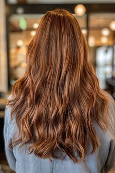 Natural light brown hair with a sun-kissed effect, adding warmth and a soft glow. Light Brown Hair Natural, Golden Light Brown Hair, Natural Light Brown Hair, Hair Colors For Brunettes, Colors For Brunettes