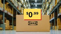 an ikea sign sitting on top of a cardboard box in a large warehouse filled with boxes