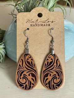 🌟 Elevate Your Style with Damask Engraved Wood Earrings - Swirled Teardrop Dangle Design! 🌸 Introducing a touch of timeless elegance to your jewelry collection - our Damask Engraved Wood Earrings. These swirled teardrop dangle earrings are a graceful blend of intricate design and lightweight comfort, creating a versatile accessory that effortlessly transitions from casual chic to sophisticated elegance. 🎁 Gift For Her - Ready to Gift: Surprise the special woman in your life with a timeless gift that reflects her unique style. Packaged with care, these Damask Engraved Wood Earrings make an ideal present for birthdays, anniversaries, or any celebration deserving of a touch of refined beauty. 🌸 Versatile Elegance: From brunch dates to evening soirées, these earrings effortlessly enhance y Teardrop Fish Hook Earrings Gift, Etching Inspiration, Cnc Ideas, Earring Wire, Earring Designs, Silver Fish, Teardrop Dangle Earrings, Fish Hook Earrings, Timeless Gifts