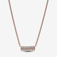 Maximize your full sparkle potential with the Pandora Timeless Pavé Double-row Bar Collier Necklace. This versatile piece features a curved bar pendant fixed to the chain with a geometric finish and a double row of sparkle, enhanced with extra rows of stones that face outwards on each side. Add a warm glow with our 14k rose gold-plated finish that offsets the three-dimensional sparkle. Adjustable to two lengths, wear this piece as a statement on its own or layer with more styles for a bold look. Pandora Necklace, Curved Bar, Necklace Rose Gold, Pave Pendant, Necklace Rose, Bar Pendant, Mua Sắm, Rose Gold Necklace, Gold Plated Necklace